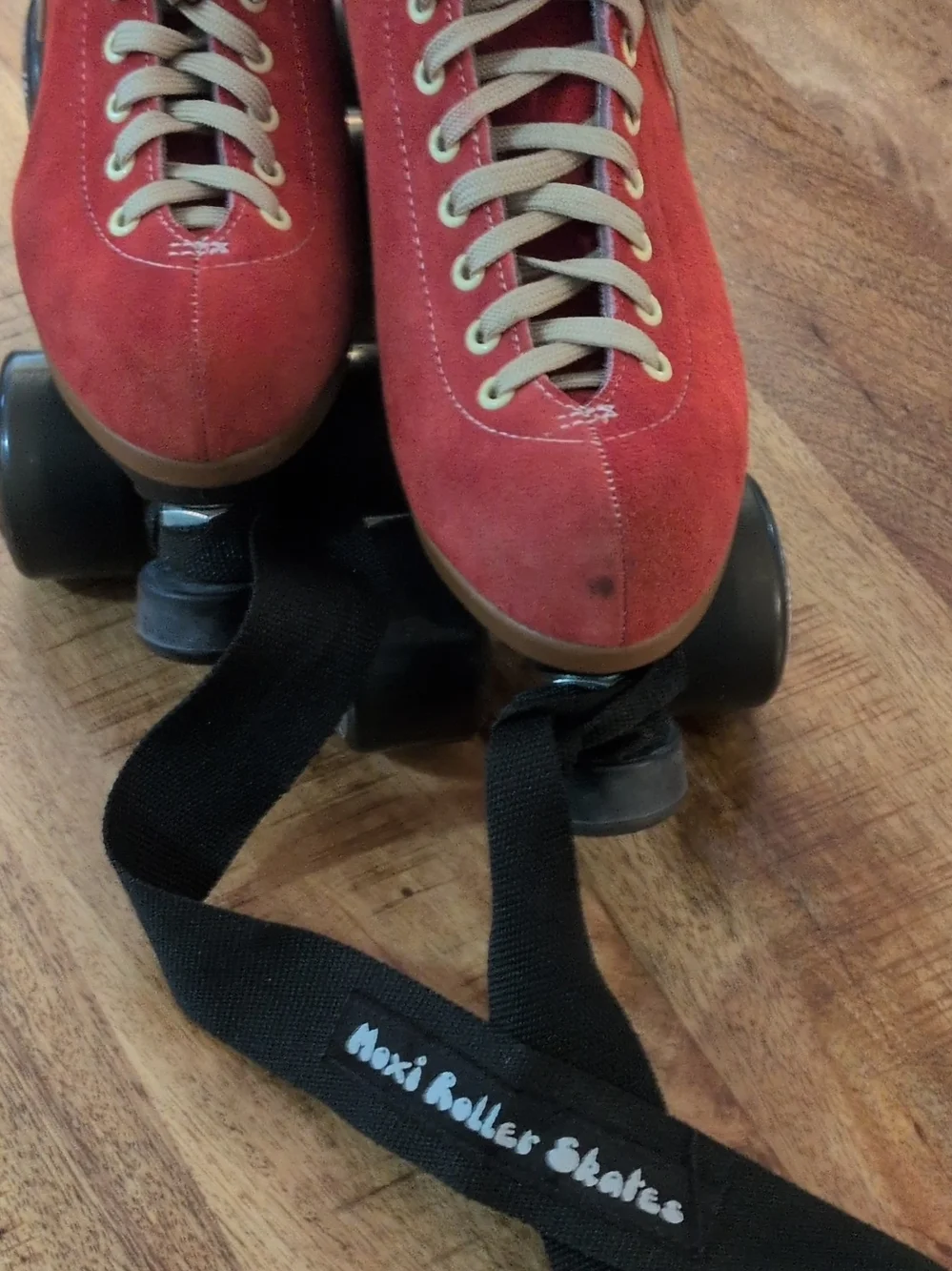 Moxi Lolly Outdoor Complete Quad Roller Skates in Poppy Red.